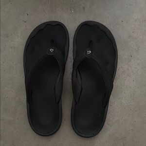 OluKai Black Ohana Flip Flops